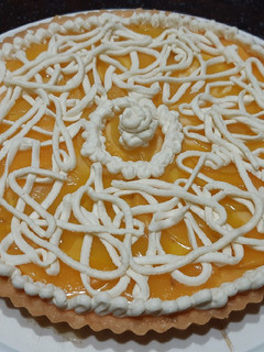 Una foto de Tarta frutal de duraznos