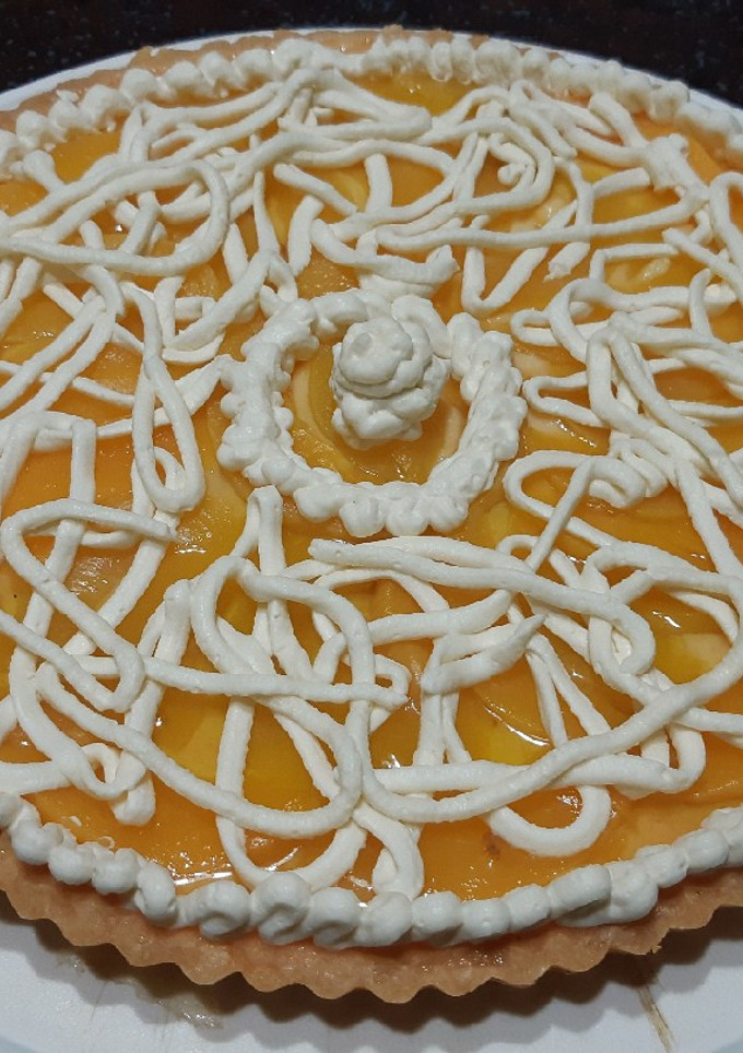 Una foto de Tarta frutal de duraznos