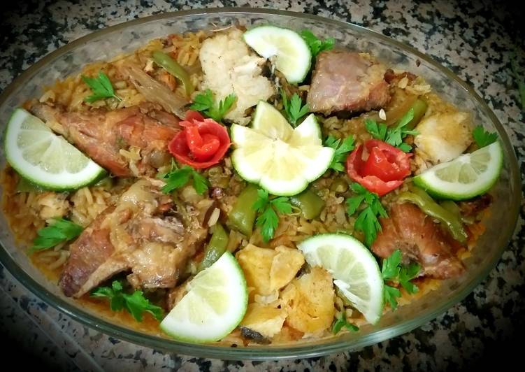 Meat paella and chicken, fish