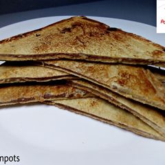 A picture of Fried plantain and chocolate bread sandwich.