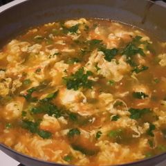 A picture of Vegetables egg drop soup.