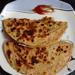 Chana & hung curd roti tacos A picture of Chana & hung curd roti tacos.