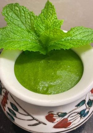 A picture of Raw tamotoes neem chutney.