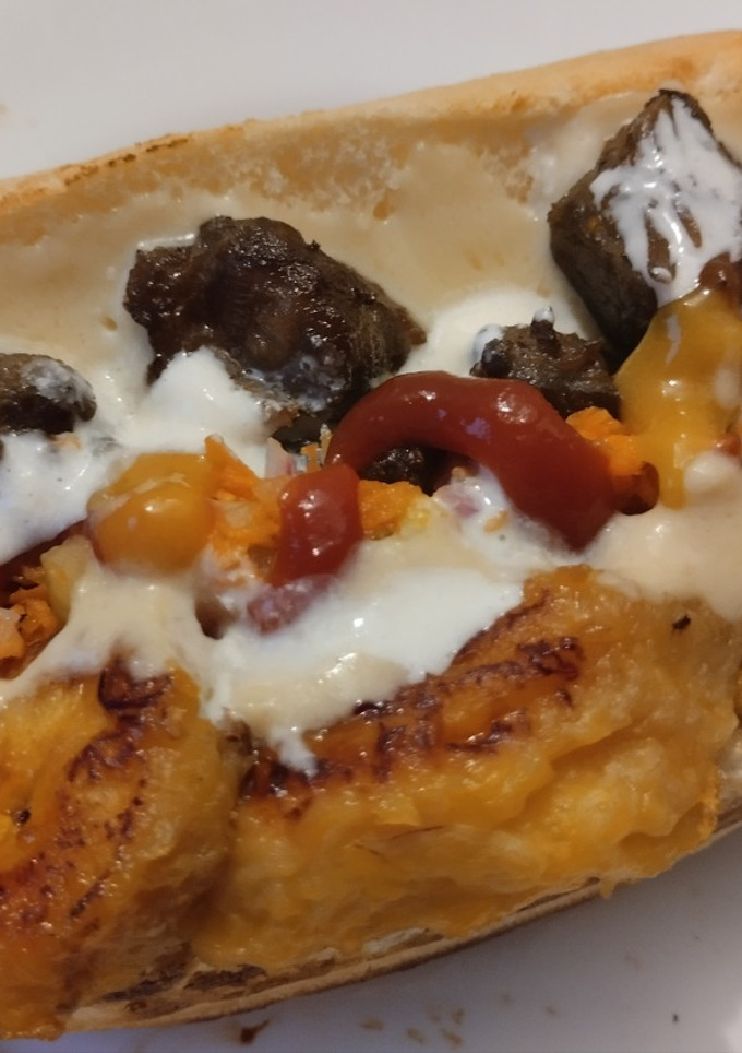 Una foto de Sánduche🥯de carne,🍖queso🧀y plátano🥙maduro🌮