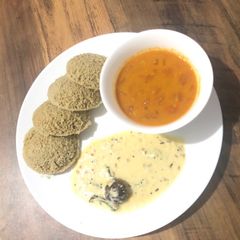 A picture of Millet Idli (Steamed savoury millet cake).