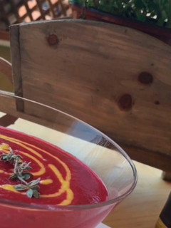 A picture of Beet gazpacho with mango vinaigrette.
