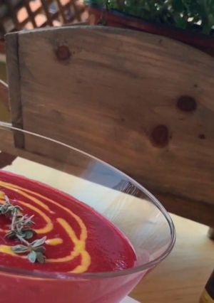 A picture of Beet gazpacho with mango vinaigrette.