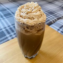 A picture of Mocha Cookie Frozen Coffee with Coffee Whipped Cream.