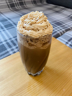 A picture of Mocha Cookie Frozen Coffee with Coffee Whipped Cream.