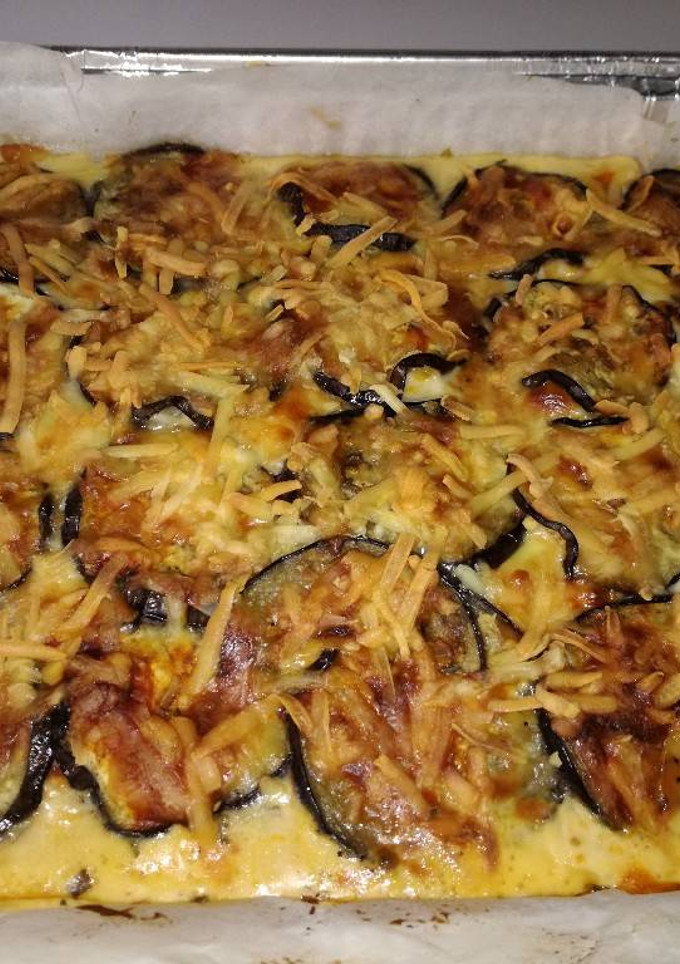 Una foto de Pastel de berenjena con jamón york y queso tierno