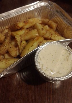 Una foto de Papas rústicas con mayonesa casera