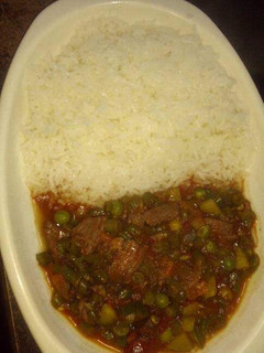 A picture of Rice with Beef stew.