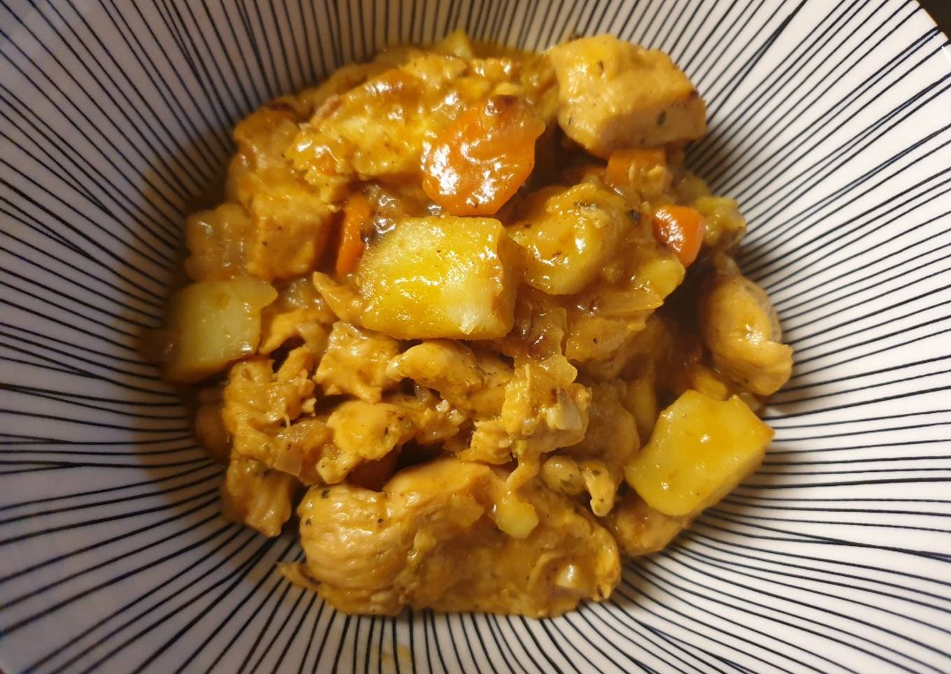 Pollo con naranja y patatas