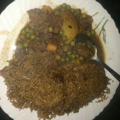 A picture of Pilau with beef stew.