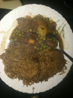 A picture of Pilau with beef stew.