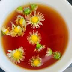 A picture of Irish wild berry and fresh camomile tea.