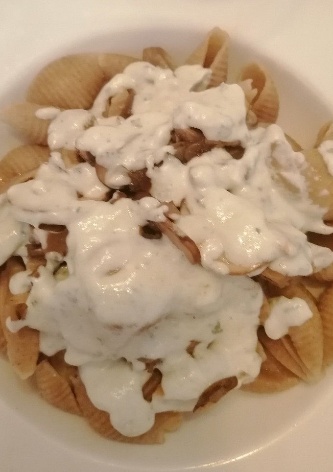 Una foto de Pasta con champiñones y queso