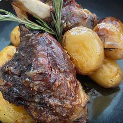 A picture of Oven steamed Oregano Greek potatoes.