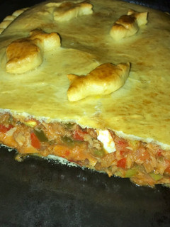Una foto de Irresistible Empanada Gallega 🥟