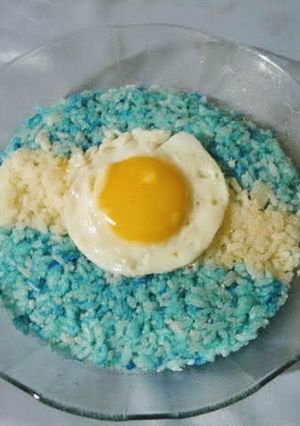 Una foto de Arroz con queso y huevo frito a la Argentina!!