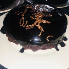 A picture of Chocolate moist cake with chocolate ganache.