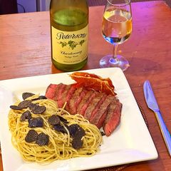 A picture of Spaghetti ala Nursina - Spaghetti with Black Truffles with Wagyu Steak.