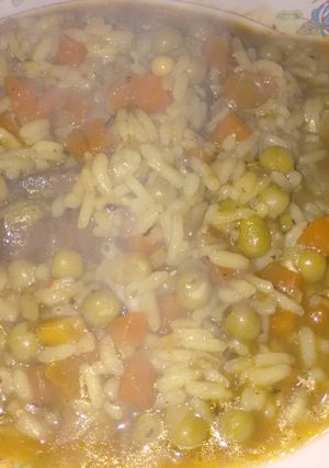 Una foto de Osobuco al Malbec y azafrán con arroz