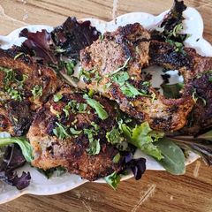 A picture of Aromatic veal chops.