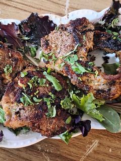 A picture of Aromatic veal chops.