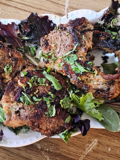 A picture of Aromatic veal chops.