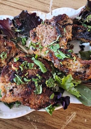 A picture of Aromatic veal chops.
