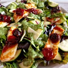 A picture of Roasted cherry and halloumi salad.