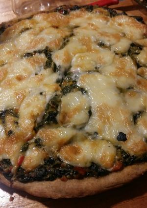 Una foto de Pizza vegetariana