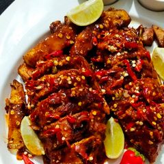 A picture of Spicy chicken Tandori.