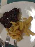 Costillas glaseadas con reducción de cerveza negra
