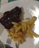 Costillas glaseadas con reducción de cerveza negra