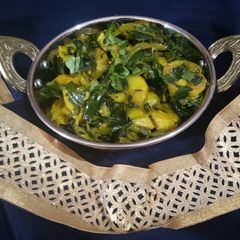 A picture of Hare pyaj aalo ki sabji.