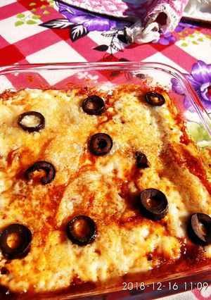 A picture of Flattened rice creamy pizza.