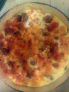 A picture of Cumberland Sausage, Ham and Tomato Quiche with 2 Cheeses.