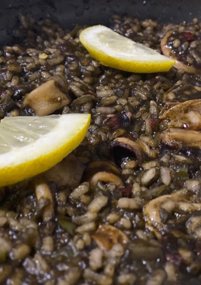 Una foto de Arroz con chipirones
