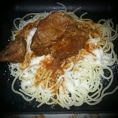 A picture of Greek Reddened Veal with Pasta and Grated Myzithra / Μοσχάρι κοκ.