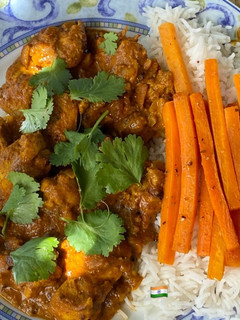 Una foto de Pollo tikka masala