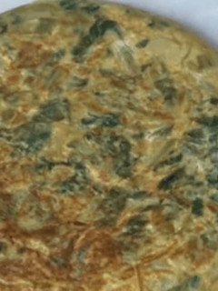 Una foto de Tortilla de papa y acelga