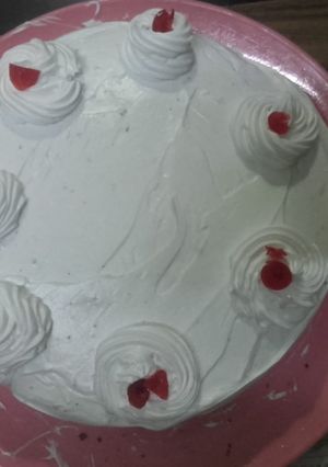 A picture of Chocolate cake with cream frosting.
