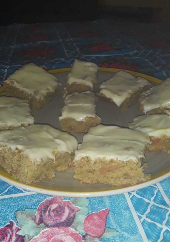 Una foto de Torta Carrot cake cubierta de queso crema