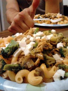 A picture of chicken and broccoli.