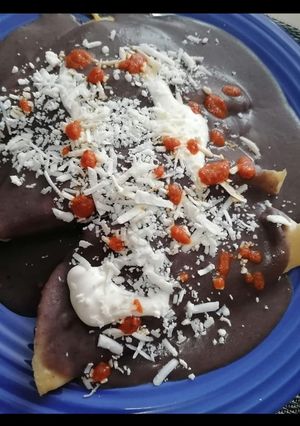 Una foto de Enfrijoladas de pollo