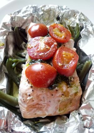 A picture of Salmon with Pesto on a Bed of Green Beans.