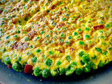 Tortilla de guisantes frescos y jamón ibérico