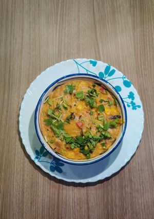 A picture of Vegetable Broken Wheat (Dalia) Khichdi.